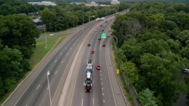 Aerial shot of Highways Traffic passing on road. High quality 4k footage