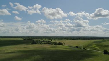 Aerial view Green fields before at summer. farm land . High quality 4k footage
