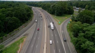 Aerial shot of Highways Traffic passing on road. High quality 4k footage