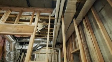 Ceiling mounted hvac system under insulated air conditioner return in home. High quality 4k footage