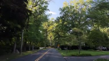 Driving City Suburb Street While POV Suburban Urban Residential Road . High quality 4k footage
