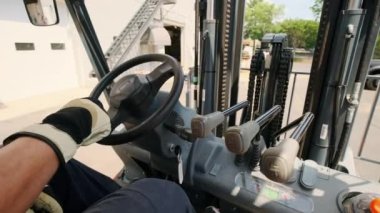 Forklift load cargo from dock Logistics and cargo transportation concept. High quality 4k footage