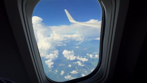 Wing Flying Soft Fluffy Clouds Airplane Seen Passenger Porthole High — Vídeos de Stock