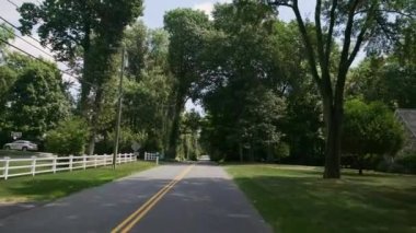 Driving City Suburb Street While POV Suburban Urban Residential Road . High quality 4k footage