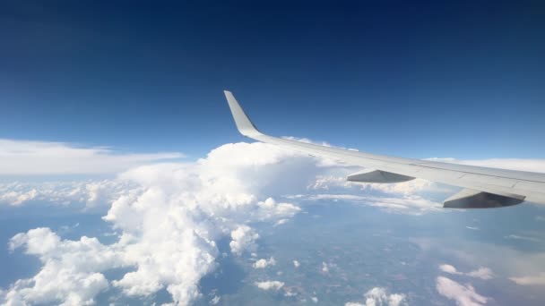 Wing Flying Soft Fluffy Clouds Airplane Seen Passenger Porthole High — Video Stock