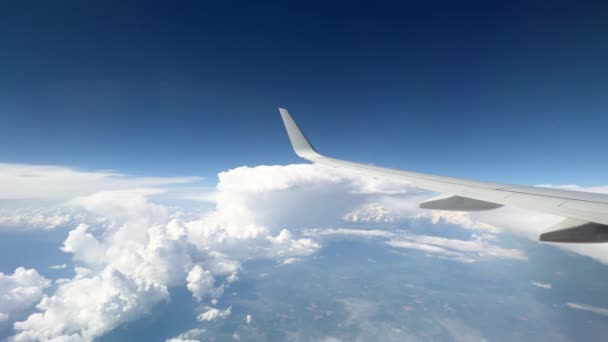 Wing Flying Soft Fluffy Clouds Airplane Seen Passenger Porthole High — 图库视频影像