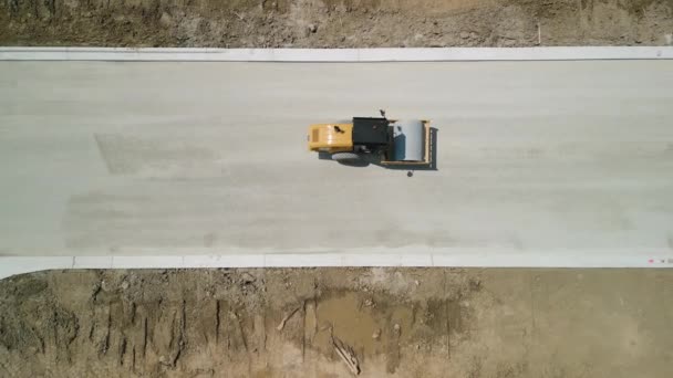 Construction Truck Tipping Dumping Gravel Road Construction Site Aerial Footage — Stock Video