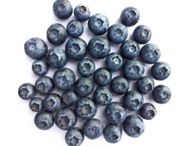 Blueberry scatter on white isolated background.