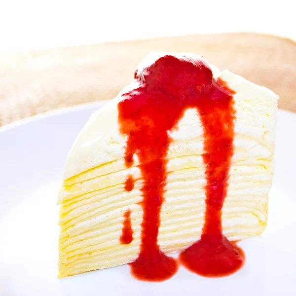 Crepe cake with strawberry sauce — Stock Photo, Image