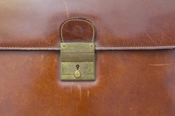 Close-up of lock on leather business case — Stock Photo, Image