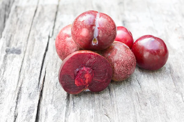 Bright red plums — Stock Photo, Image