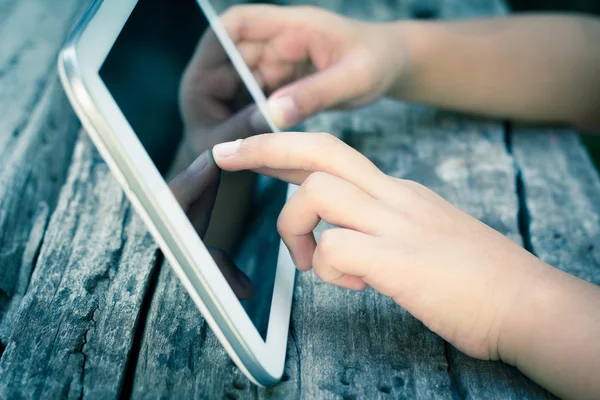 Little girl playing on digital tablet — Stock Photo, Image