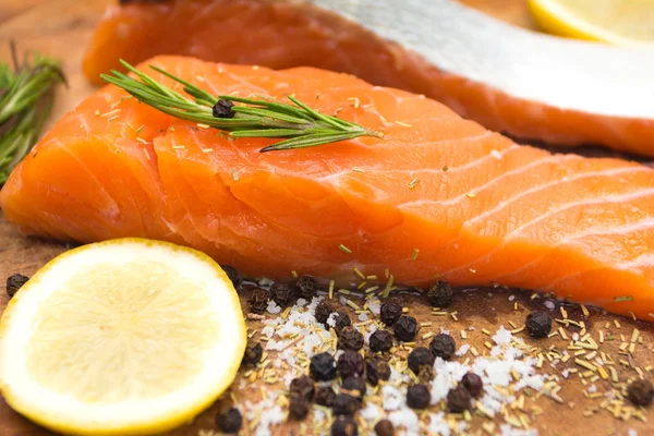 Fresh salmon with spices — Stock Photo, Image