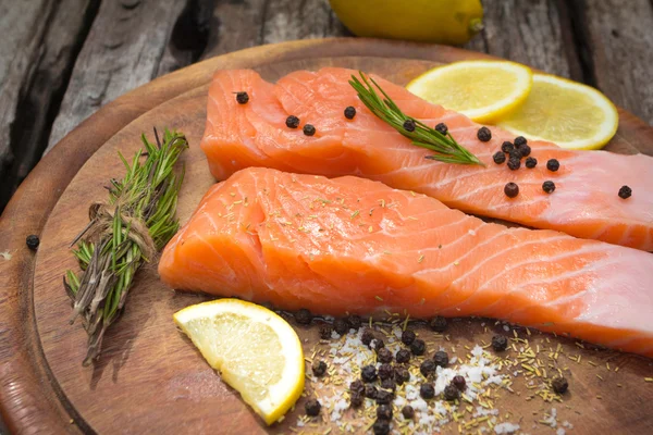 Fresh salmon with spices — Stock Photo, Image