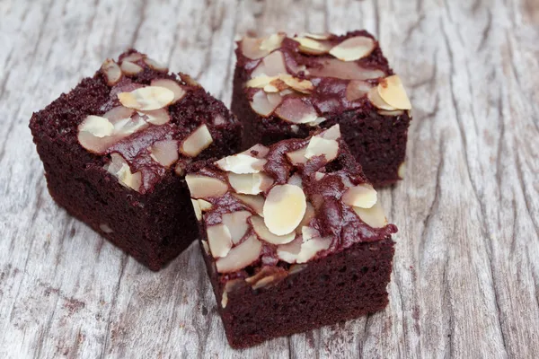 Almond brownie on old wood — Stock Photo, Image
