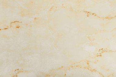 Soyut sıvı sanat arka plan bej renkleri. Yumuşak sarı gradyanlı tuvale suluboya boya. Tasarım için fırça darbesi dokusu. Yağlı boya yüksek çözünürlüklü dikişsiz doku. Boşluğu kopyala 