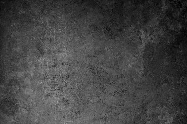 Soyut koyu taş dokusu. Kirli duvar arkaplanı ya da fotokopi alanı olan duvar kağıdı. Çizikli, yaşlı, huysuz gri bir doku. Sıkıntılı gri grunge pürüzsüz doku. Çizilmiş arkaplan