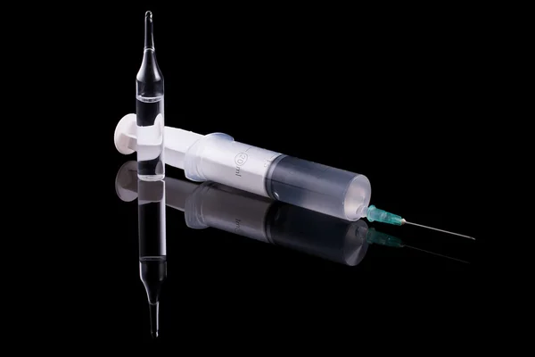 Syringe and glass vial — Stock Photo, Image