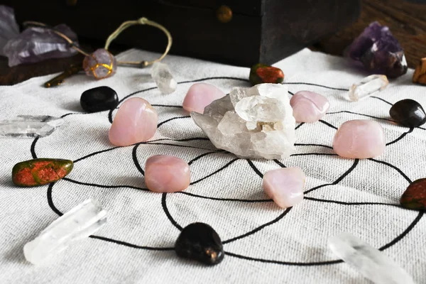 A close up view of a healing crystal grid using sacred geometry and healing crystals.