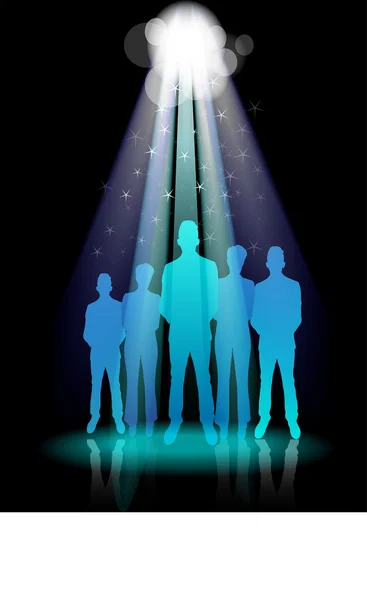 Sahne ışıkları altında duran iş grubunun resmi