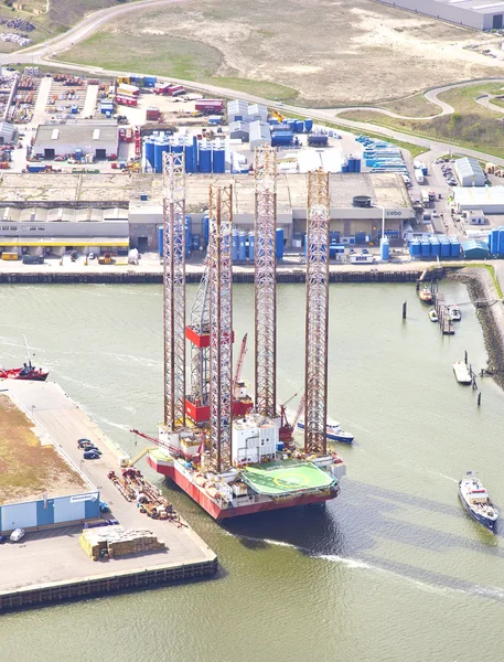 IJMUIDEN, THE NETHERLANDS - APRIL 15: Aerial view on offshore island in harbour of IJmuiden, The Netherlands at April 15 2014. Offshore islands are essential in gaining oil and gas for worldwide usage — Stock Photo, Image