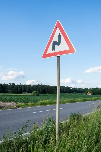 Segnale stradale Winding Road — Foto Stock