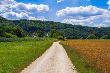 Country road through the Altmuehltal valley (Bavaria, Germany)