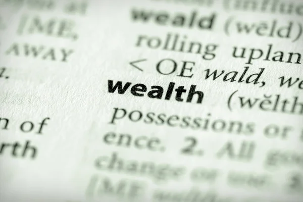Серия словарей - Экономика: богатство — стоковое фото