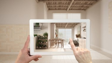 Gelişmiş gerçeklik kavramı. Seramik seramik seramik döşemeli mobilya ve tasarım ürünlerinin simülasyonunda kullanılan AR uygulaması ile el ele tutuşan tablet. Mutfak, oturma odası, masa.