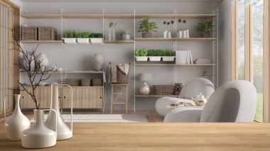Japon tarzı, koltuk, parke döşeme, minimalist mimari iç tasarım gibi bulanık modern oturma odasının üzerinde minimalist modern vazolarla ahşap masa veya raf.