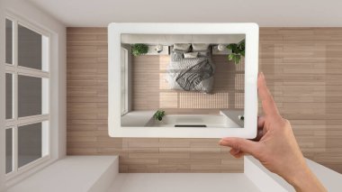 Gelişmiş gerçeklik kavramı. Özel mimari tasarım, siyah mürekkep çizimi, yatak odası, üst manzara, plan gibi mobilya ürünlerini taklit etmek için kullanılan AR uygulamalı el bilgisayarı tableti