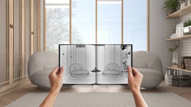 Yaratıcı salon tasarımı tasarım taslağı ya da çizimi olan not defterini tutan eller. Gerçek bir iç dizayn projesi. Önce ve sonra, mimar tasarım iş akışı fikri