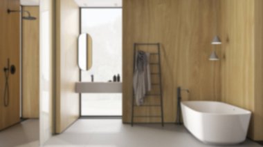 Bulanık arka plan, ahşap duvarlı rahat minimalist banyo, serbest banyo küveti, lavabo, ayna, aksesuarlar, duş camı, seramik fayanslar, kolye lambaları, iç tasarım fikri