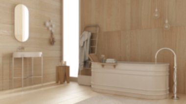 Bulanık arka plan, ahşap duvarları ve zemini olan modern rahatlatıcı banyo, serbest banyo küveti, seramik lavabo, havlu askı, kolye lambası, halı, rahat bir iç tasarım fikri.