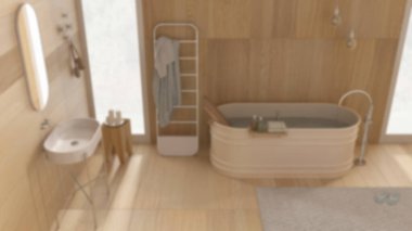Bulanık arka plan, ahşap duvarları ve zemini olan rahat bir banyo, spa stili, küvet, lavabo, havlu askı, lamba, halı. En düşük kalitede iç tasarım, üst görünüm, yukarıda