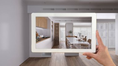 Gelişmiş gerçeklik kavramı. Özel mimari tasarım, siyah mürekkep çizimi, modern mutfak ve yemek odasındaki mobilya ürünlerinin simülasyonunda kullanılan AR uygulaması ile el ele tutuşma tableti