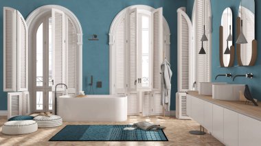 Klasik dairede kemerli pencereli mavi tonda modern banyo. Serbest banyo küveti, lavabo ve aynalar, halı, havlu ve bornoz dolu raflar. Minimalist iç tasarım