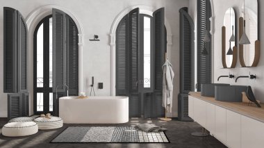 Modern banyo koyu tonlarda klasik dairede kemerli camlı. Serbest banyo küveti, lavabo ve aynalar, halı, havlu ve bornoz dolu raflar. Minimalist iç tasarım