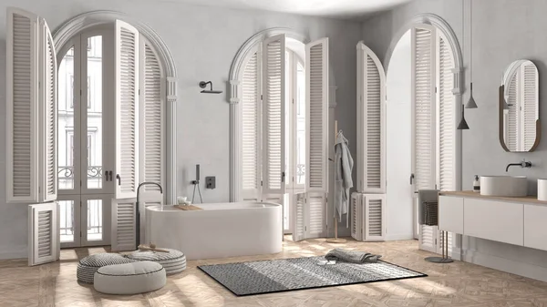 アーチ型の窓のある古典的なアパートの白い色調のミニマリストバスルーム 自立浴槽 洗面台や鏡 カーペット タオルやバスローブでラック モダンなインテリアデザイン — ストック写真