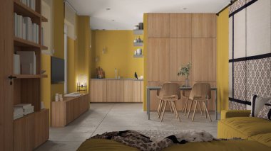 Modern minimalist oturma odası ve mutfak sarı tonlarda, beton fayanslar, kanepe, yemek masası, sandalyeler, ahşap kitaplık ve dolaplar, kumaş sürgülü kapı, mimari iç tasarım