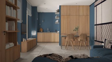 Modern minimalist oturma odası ve mutfak mavi tonlarda, beton fayanslar, kanepe, yemek masası, sandalyeler, ahşap kitaplık ve dolaplar, kumaş sürgülü kapı, mimari iç tasarım