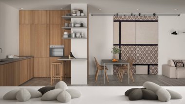 Beyaz masa, masa ya da raf üzerinde yıldız ya da çiçek şeklinde beş yumuşak beyaz yastık, ahşap oturma odası, yemek odası ve mutfak, minimalist iç mimari tasarım