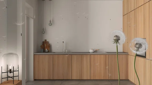 Fluffy airy dandelion with blowing seeds spores over cozy wooden kitchen with cabinets and appliances. Interior design idea. Change, growth, movement and freedom concept