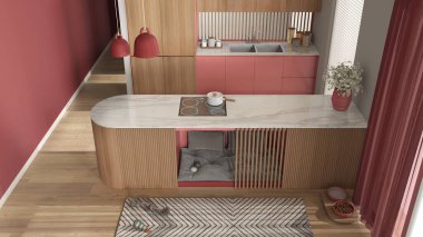 Köpek dostu ahşap ve kırmızı mutfak. Yumuşak yastıkları ve oyuncakları olan mobilyaların içindeki köpek yatağı, evcil hayvanlara ayrılmış bir alan. Halı, ikram kasesi, parke. İç tasarım fikri, üst görünüm, yukarıda