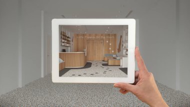 Gelişmiş gerçeklik kavramı. Terrazzo döşemeleri, veteriner hayvan kliniği gibi boş iç mekanlarda mobilya ve tasarım ürünlerinin simülasyonunda kullanılan AR uygulaması ile el ele tutuşma tableti