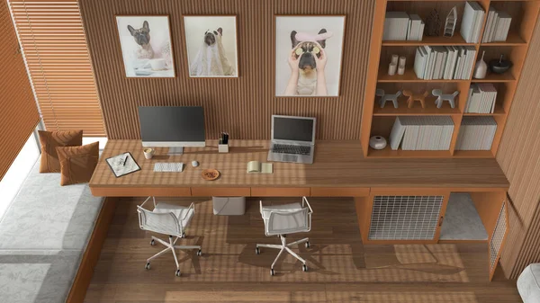 Evcil hayvan dostu portakal ve ahşap köşe ofisi sandalyeli masa, bilgisayarlar, kitaplık, kapısı olan köpek yatağı. Pencere ve parke. Fransız buldog sanat eserleri. Üst manzara, yukarıda. İç tasarım