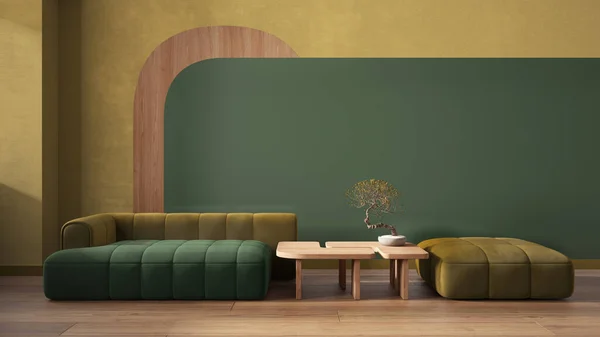 Elegant living room close up in green tones, modern sofa and pouf, wooden side table with bonsai, concrete walls with decors. Parquet floor. Copy space. Contemporary interior design