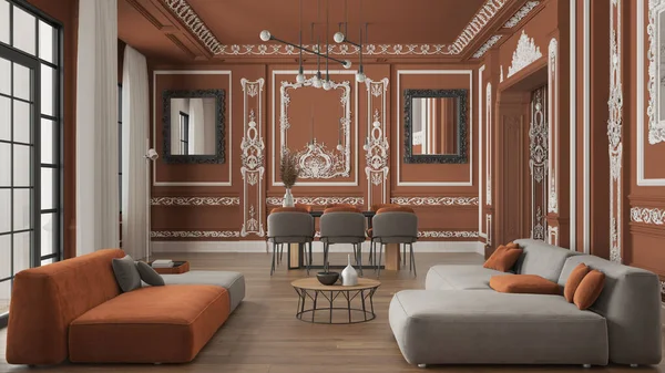 Minimalist furniture in classic apartment in orange tones, living and dining room with table and armchairs, sofa, lamps. Plaster molded walls and parquet. Baroque interior design