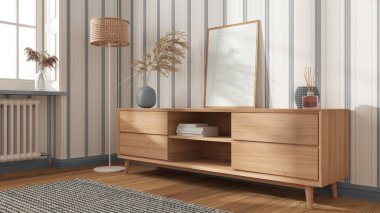 Çerçeve, ahşap çekmeceler, beyaz ve gri tonlarda çizgili duvar kağıtları, pencere ve parke ile modern konforlu oturma odasında taklit edilir. İç tasarım arka planı, İskandinav tarzı