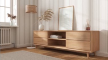 Arka plan bulanık, çerçeve modern rahat oturma odasında ahşap çekmeceler, çizgili duvar kağıtları, pencere ve parke ile taklit ediliyor. İç tasarım arka planı, İskandinav tarzı